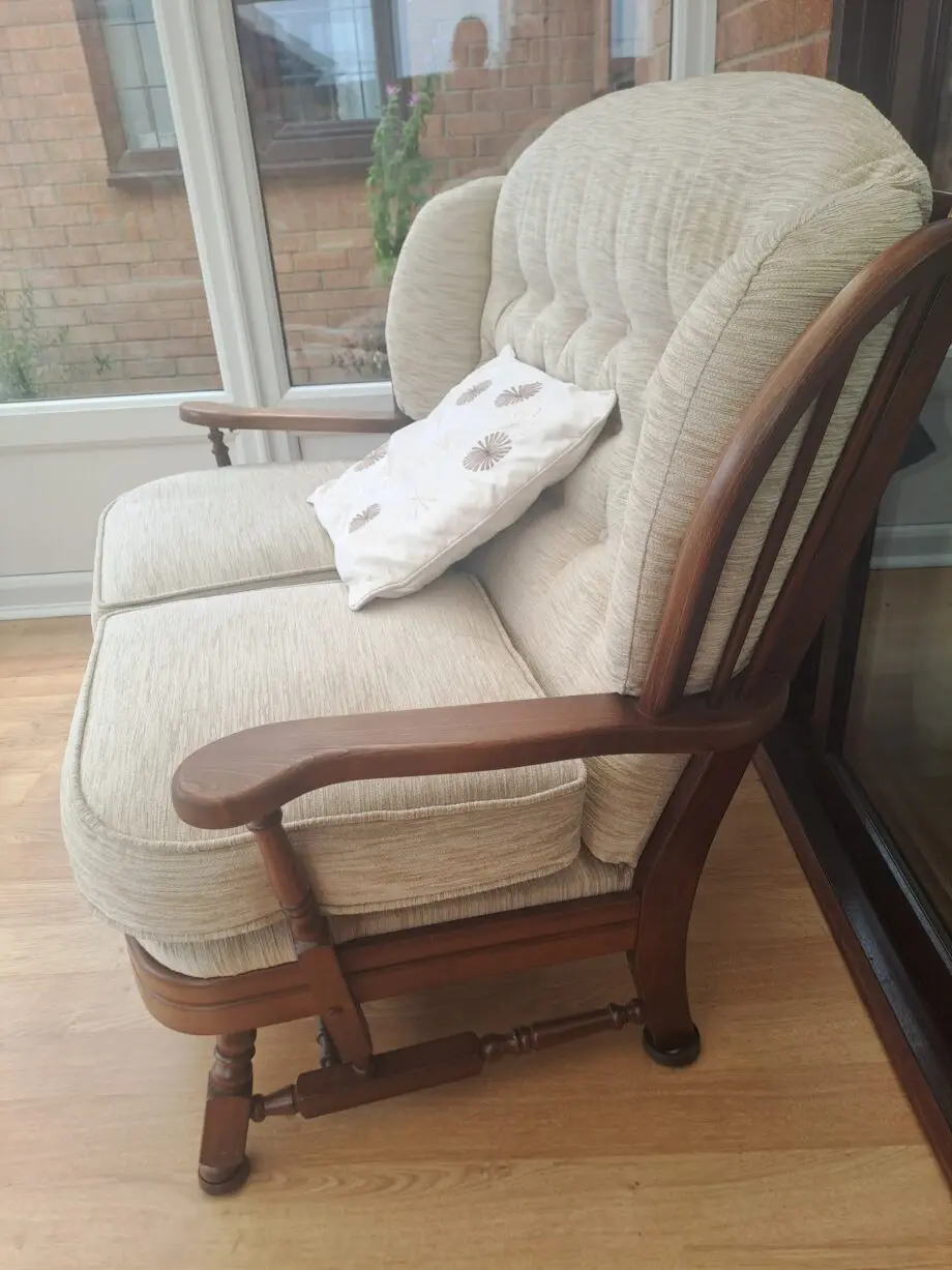 Wooden framed two Seater sofa and two arm chairs.