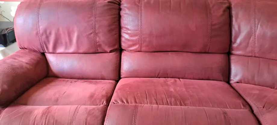 Large soft red leather corner sofa. Seats 5.