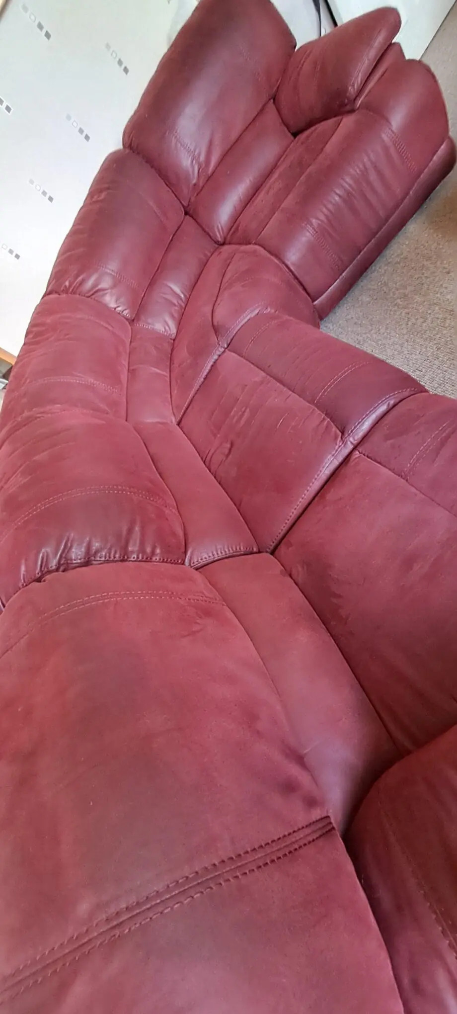 Large soft red leather corner sofa. Seats 5.