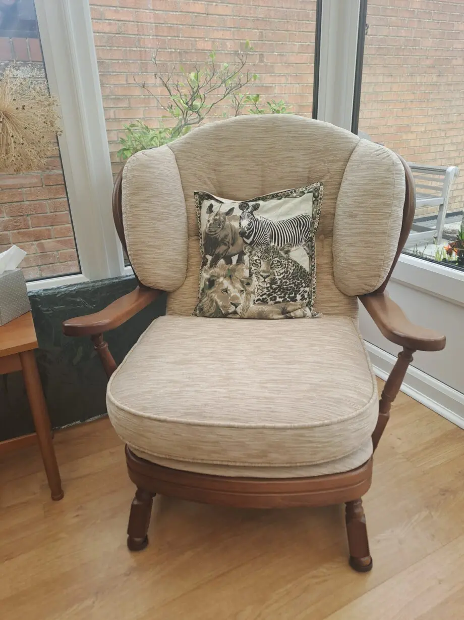 Wooden framed two Seater sofa and two arm chairs.