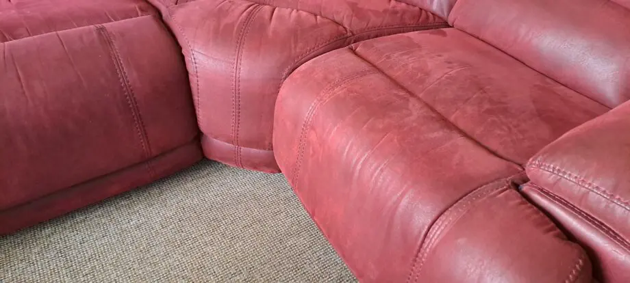 Large soft red leather corner sofa. Seats 5.