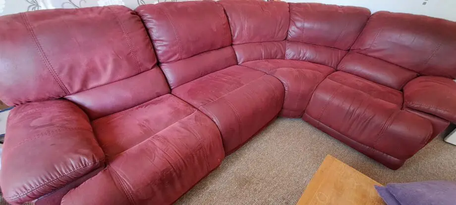 Large soft red leather corner sofa. Seats 5.