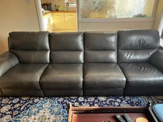 Dark Grey Sofa in 4 sections.
