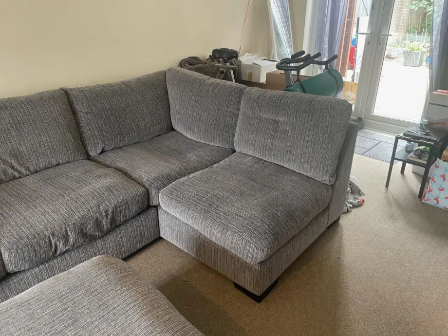 Grey DFS large corner sofa and Pouffe