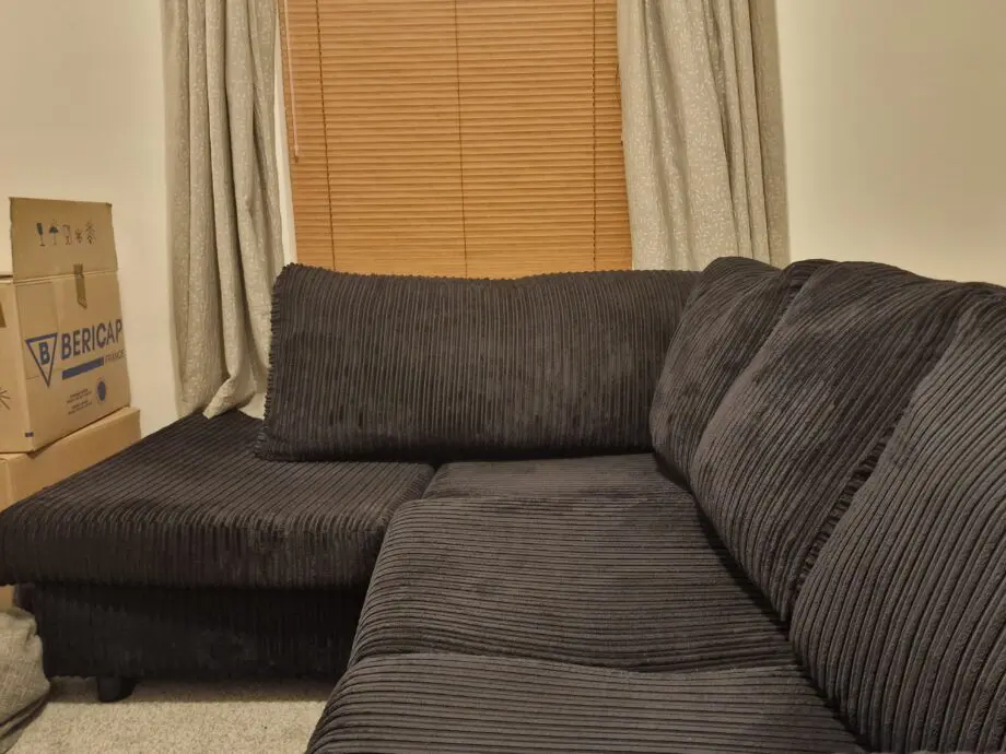 Black Jumbo Cord 4 Seater Corner Sofa (Scatterback)