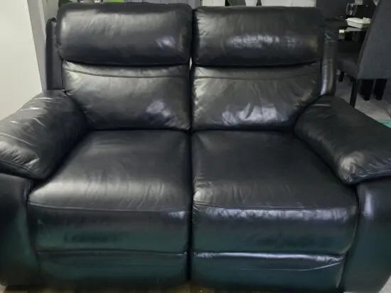 Harveys 2 seater pure black leather electric recliner sofa