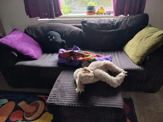 2 seater brown cordially sofa