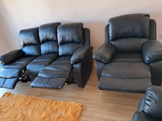 Black recliner suite leather