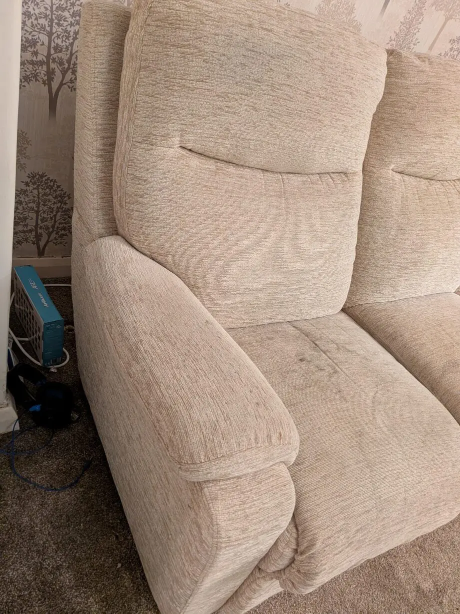 Cream sofa with footstool