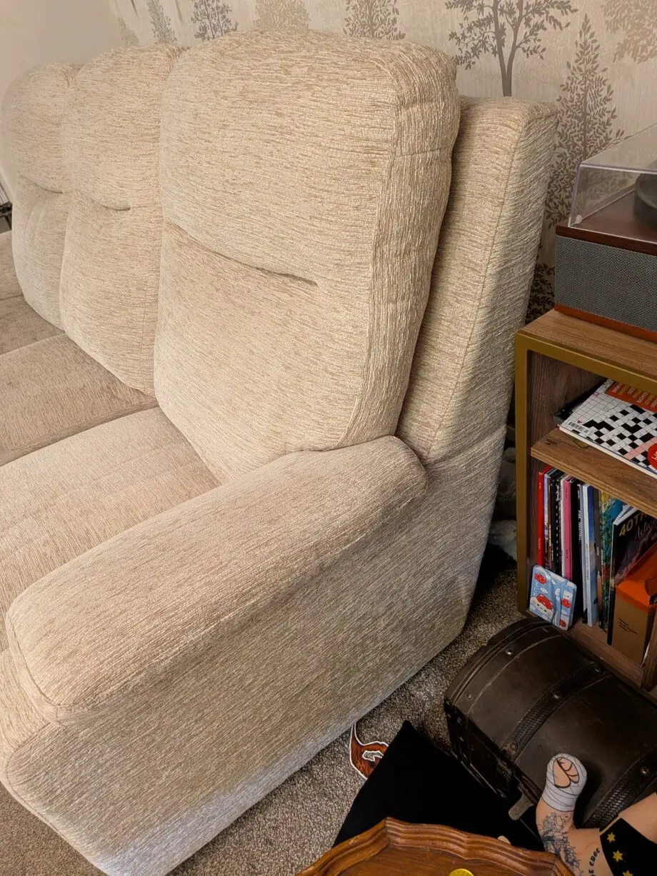 Cream sofa with footstool