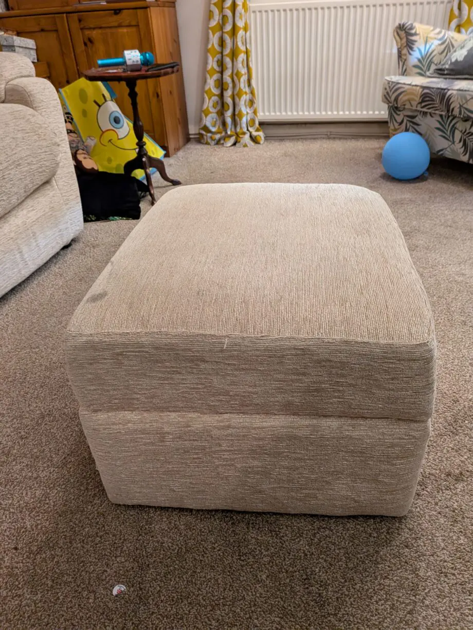 Cream sofa with footstool