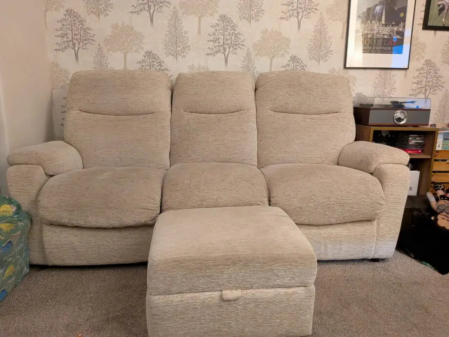 Cream sofa with footstool