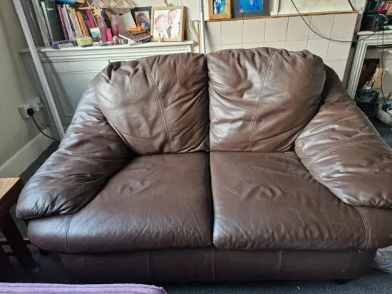 Brown 2 seater sofa