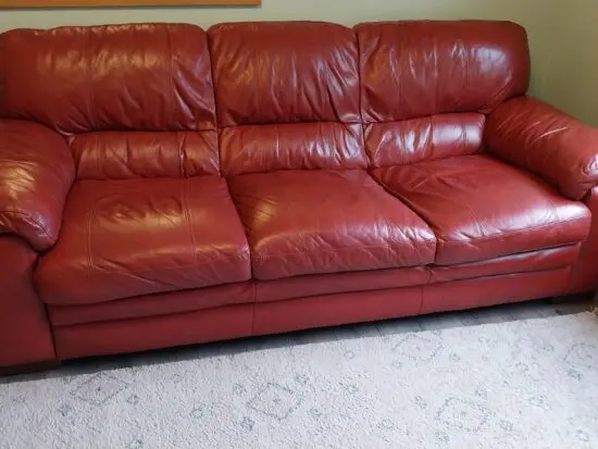Red Leather 3 seater sofa.