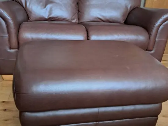 Parker Knoll Premium Quality workmanship leather Como oak 2 seater sofa plus matching footstall. .