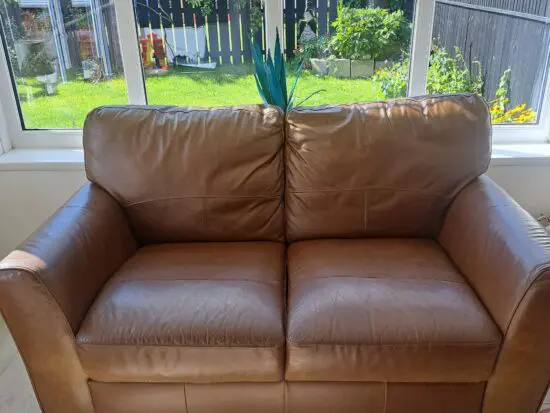 Argos 2 seater brown leather sofa.