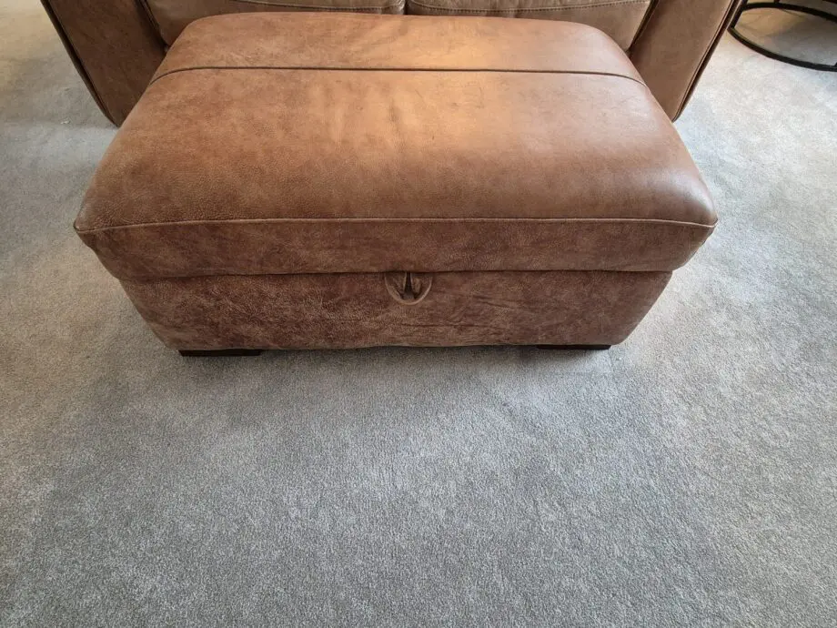 2 brown leather two-seater sofas