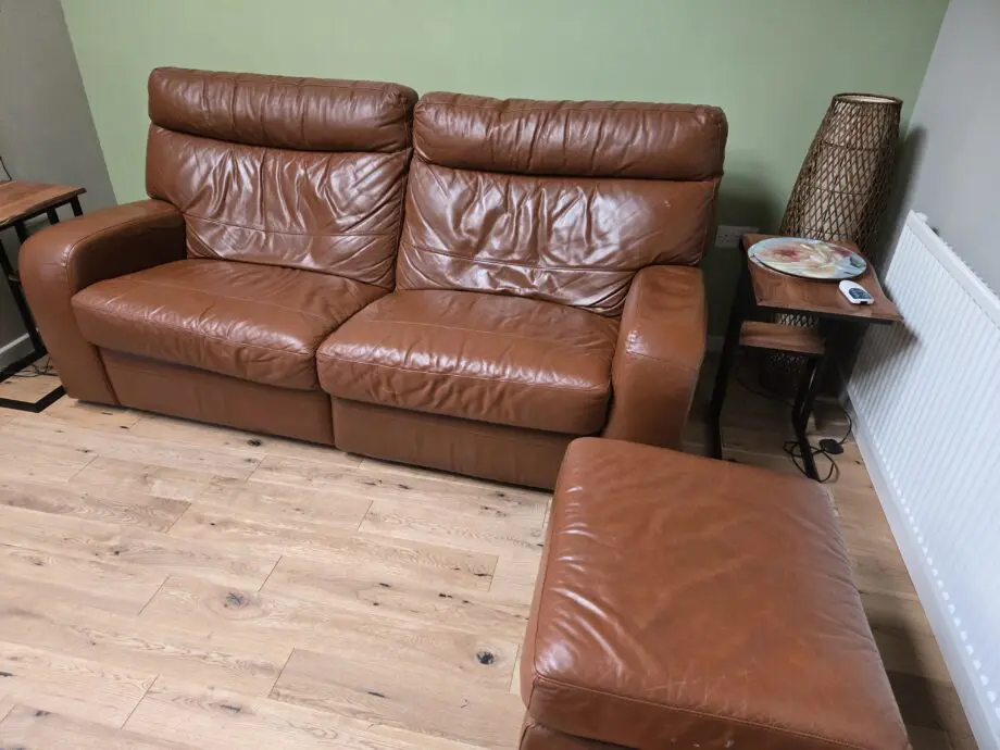 Reclined sofa and storage footstool