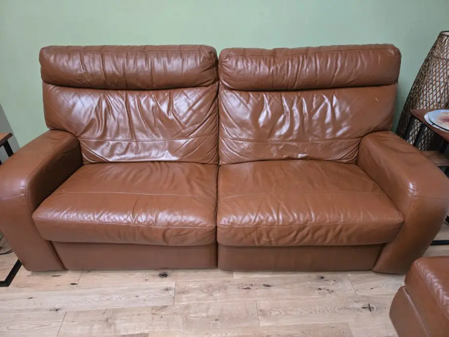 Reclined sofa and storage footstool