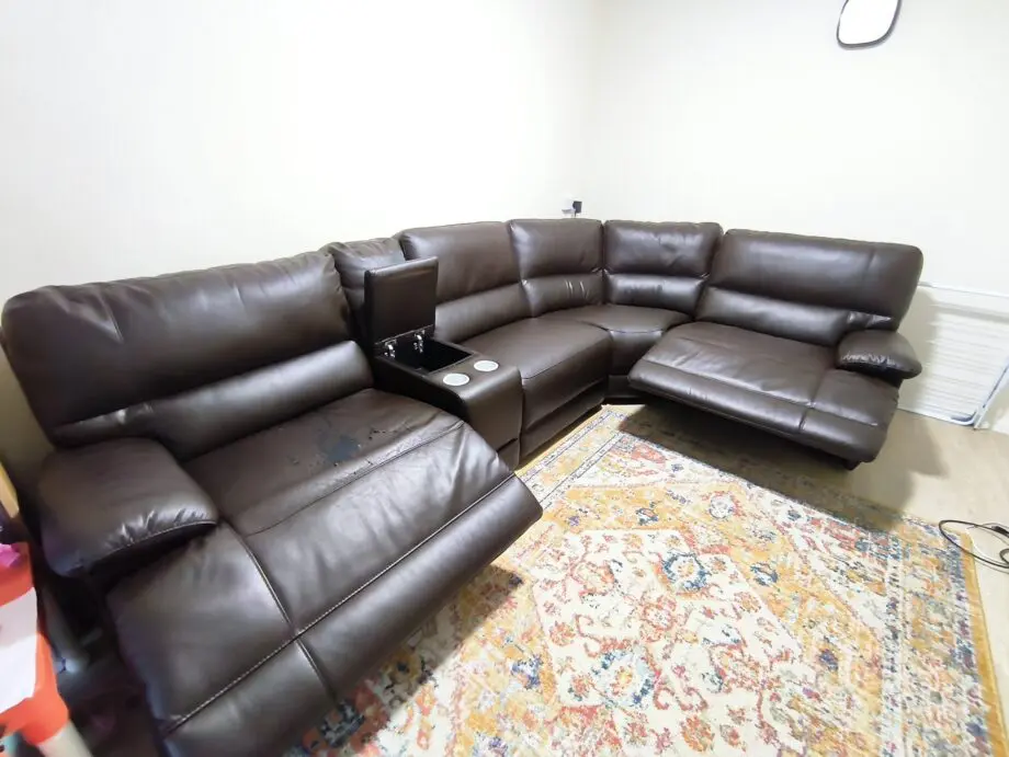 L shape brown reclining sectional sofa.