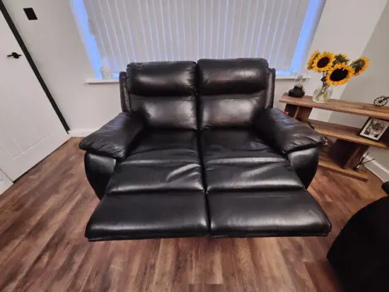 Black leather recliner sofas. 3 seater and 2 seater