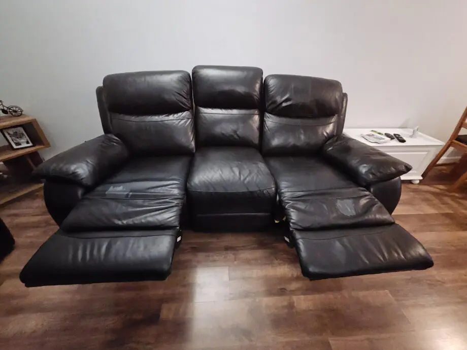 Black leather recliner sofas. 3 seater and 2 seater