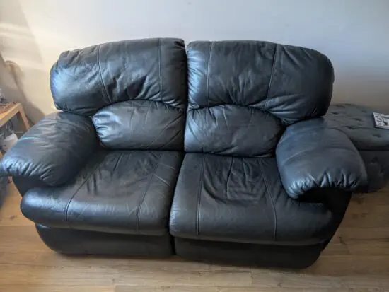 Black recliner two seater sofa