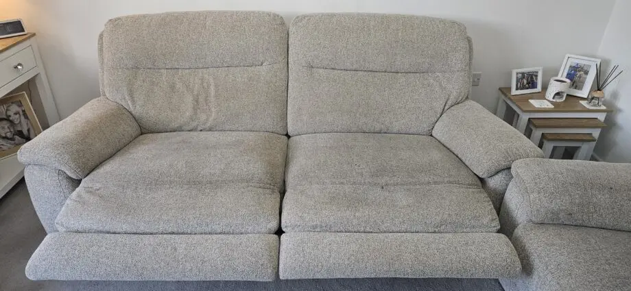 DFS 3 and 2 seater beige manual recliner sofa with ottoman Puffe