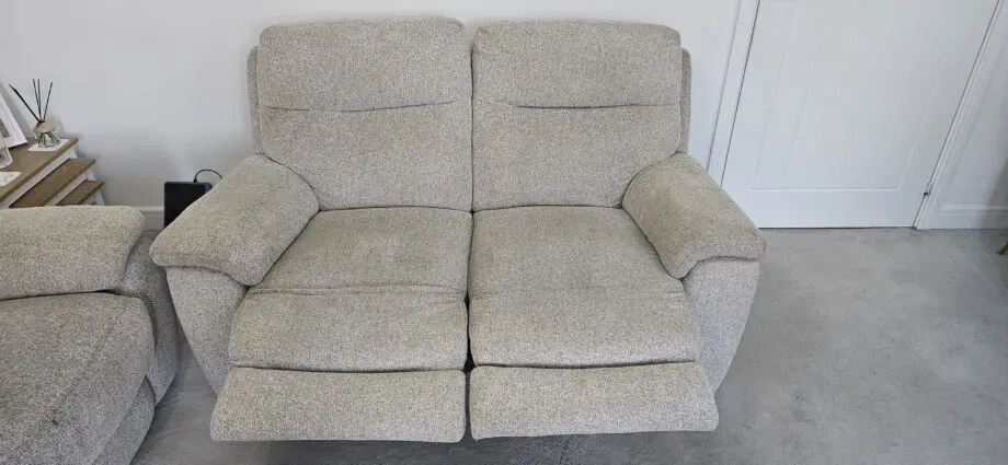 DFS 3 and 2 seater beige manual recliner sofa with ottoman Puffe