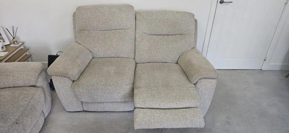 DFS 3 and 2 seater beige manual recliner sofa with ottoman Puffe
