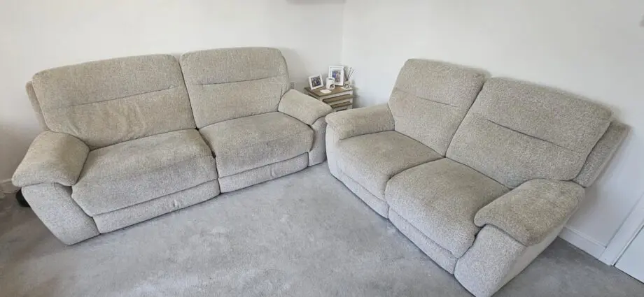 DFS 3 and 2 seater beige manual recliner sofa with ottoman Puffe