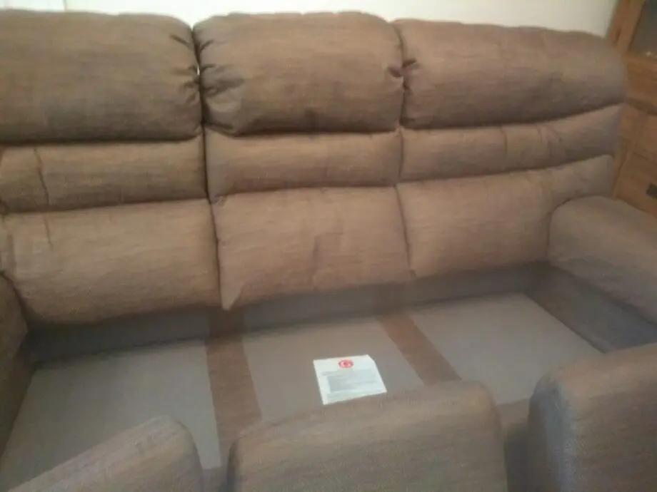 G Plan 'Malvern' three piece. SG Plan 'Malvern' three seater settee and two electric recliner chairs. Brown electric recliner chairs. brown.