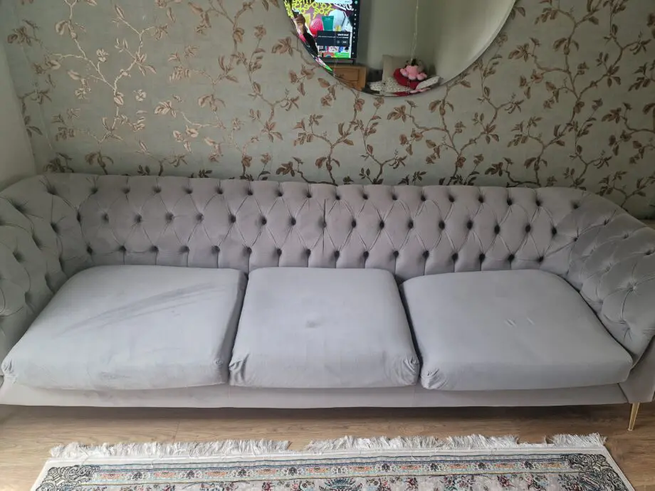 3 seater modern grey sofa. Elegant and in very good condition.