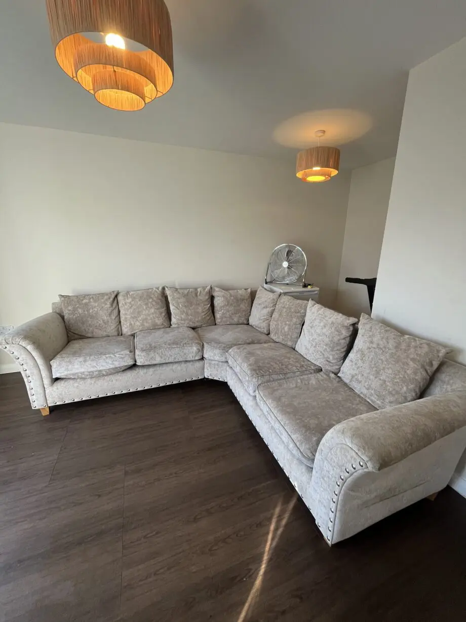 Large light grey corner sofa from dfs