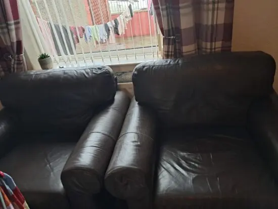 2 Brown leather chairs most go
