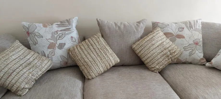 Grange & Woodhouse Corner Sofa with foot stool - Beige cloth with scatter cushions