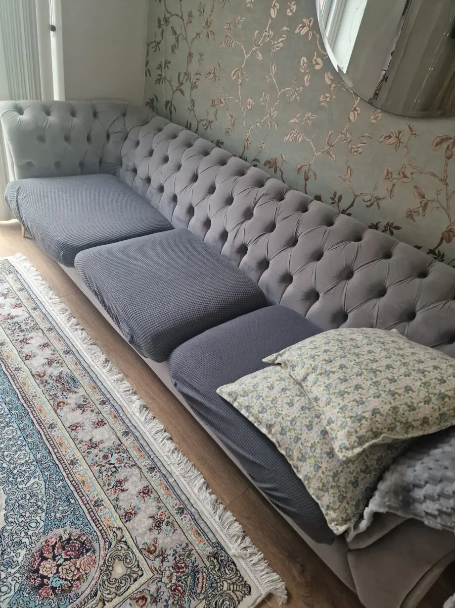 3 seater modern grey sofa. Elegant and in very good condition.