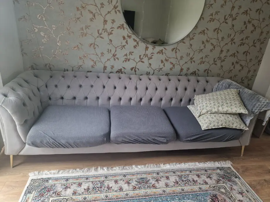 3 seater modern grey sofa. Elegant and in very good condition.