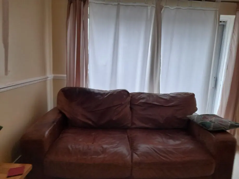 Brown leather sofa and chair