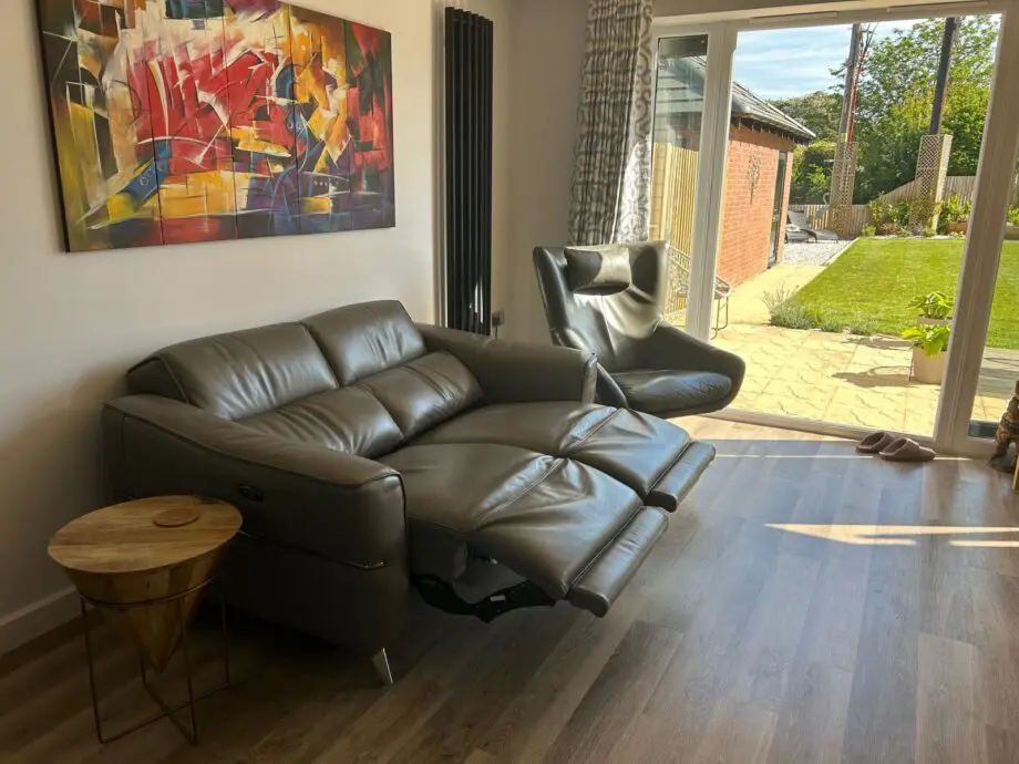 Leather 2 seater electric reclining sofa