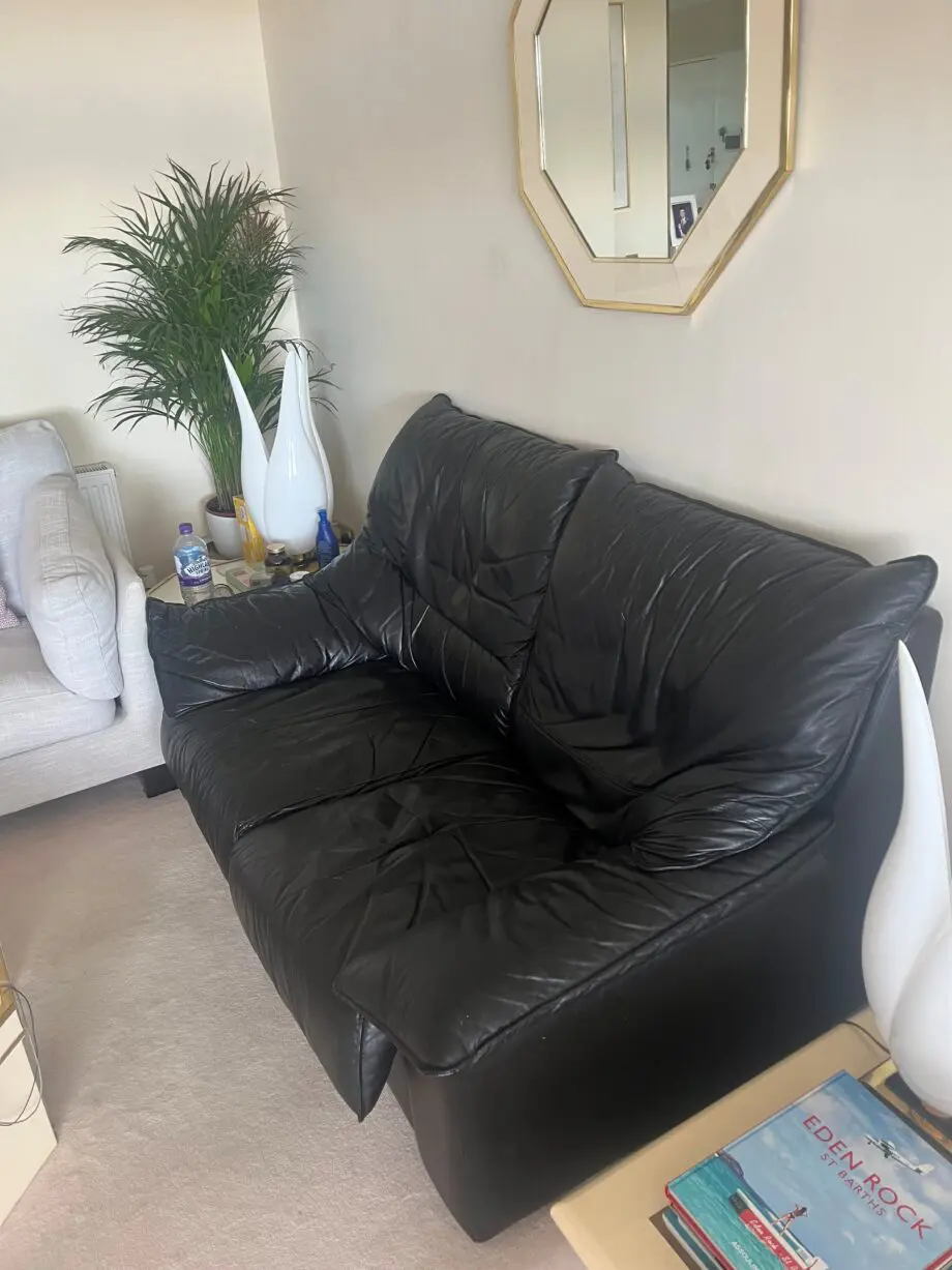 Black leather 2 seater sofa