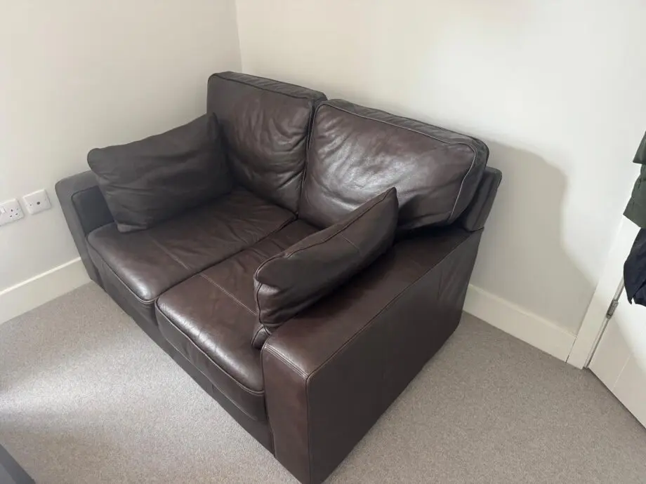 Brown 2 seater leather sofa