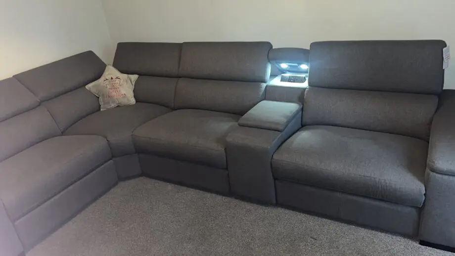 Hike Right Hand Facing Double Electric Recliner with Console & Armrest Storage. Plus adjustable headrests.