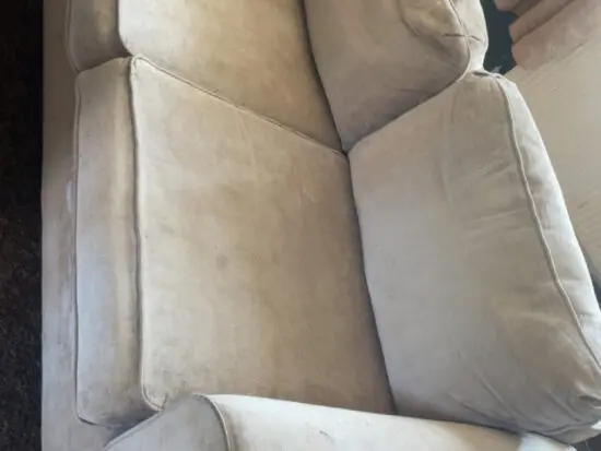 3 seat beige sofa