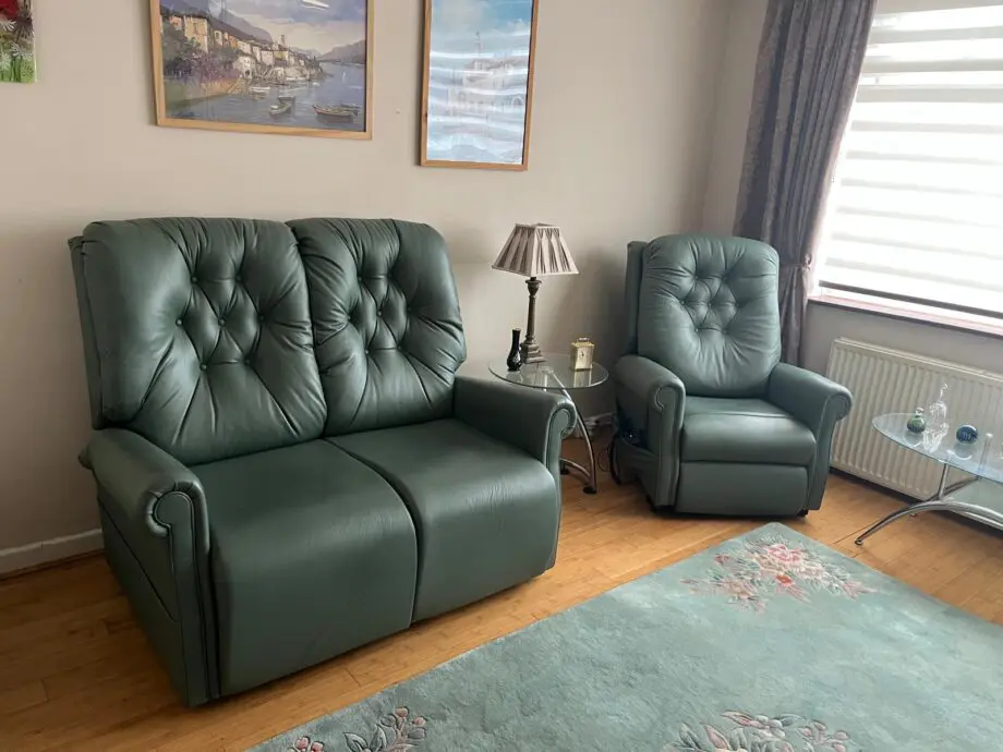 Green Leather 2 seater sofa and 2 recliner chairs