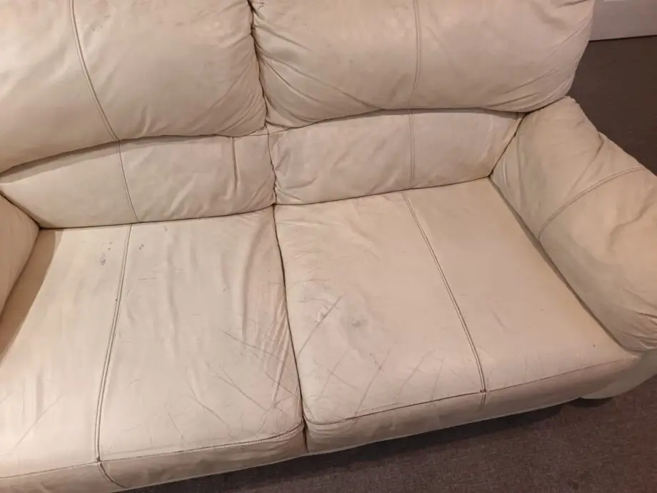 Two seater cream sofa