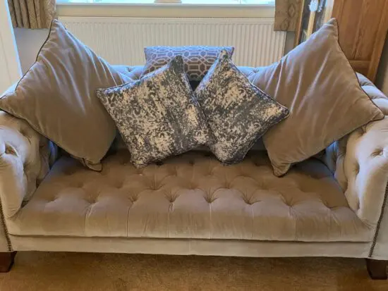 Ponsfords, Alexander and James. Mink velvet fabric sofa and two snuggle chairs.