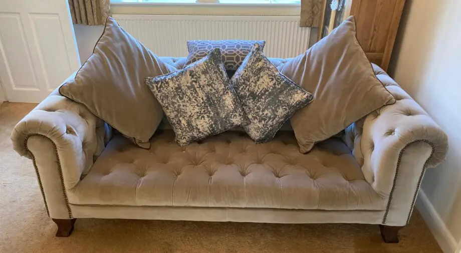 Poonsfords, Alexander and James. Mink velvet fabric sofa and two snuggle chairs.