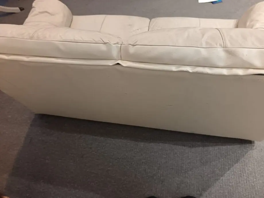 Two seater cream sofa