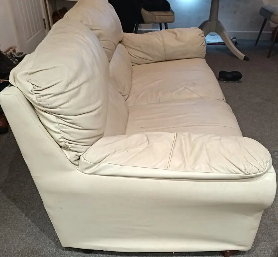 Two seater cream sofa